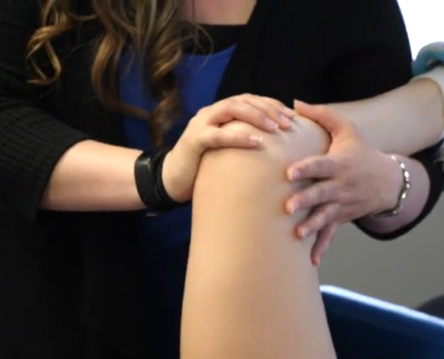 Dr. Alyssa Arms Physical Therapist treating a patient