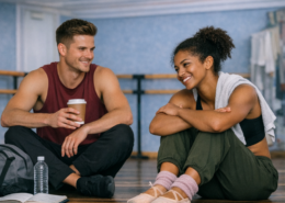 dancers sitting and talking in studio after practice